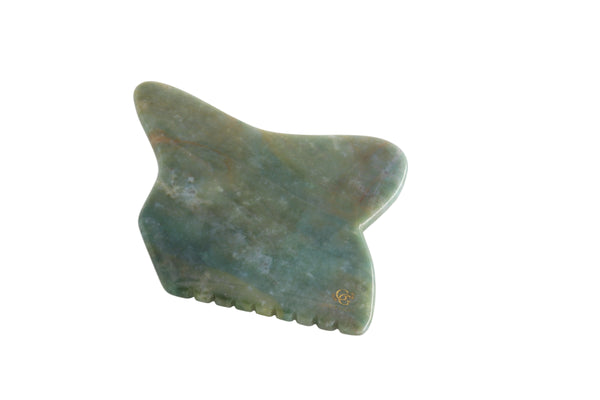 Moss agate gua sha tool, natural face sculpting stone, showcasing unique green inclusions.